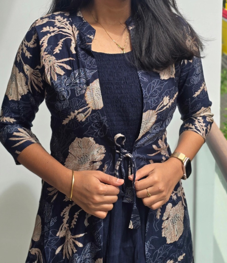 Anbarasi: Rayon western frock with coat attached