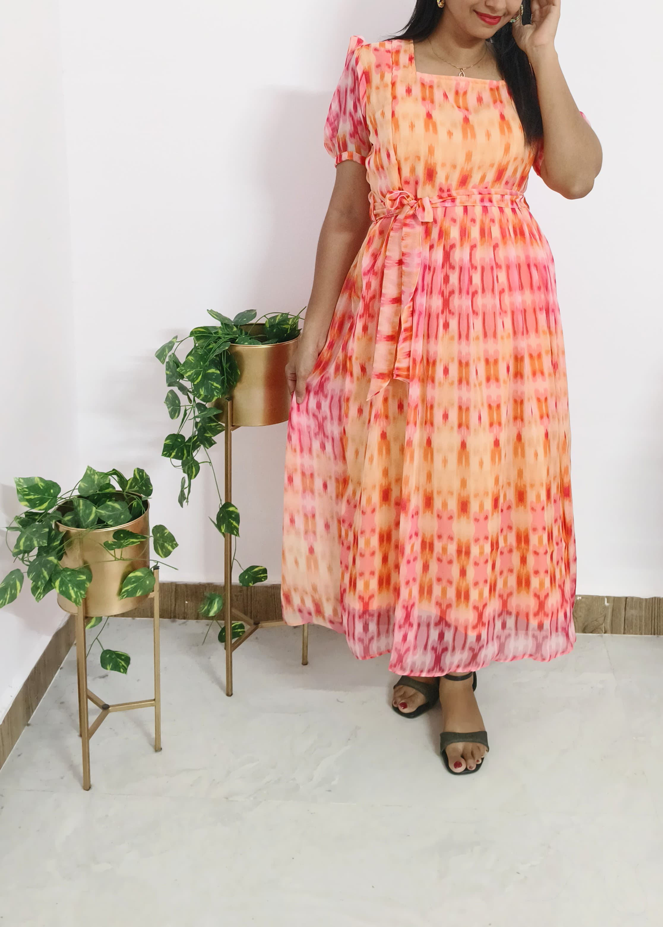 Anbarasi: Georgette pinkish orange feeding dress 