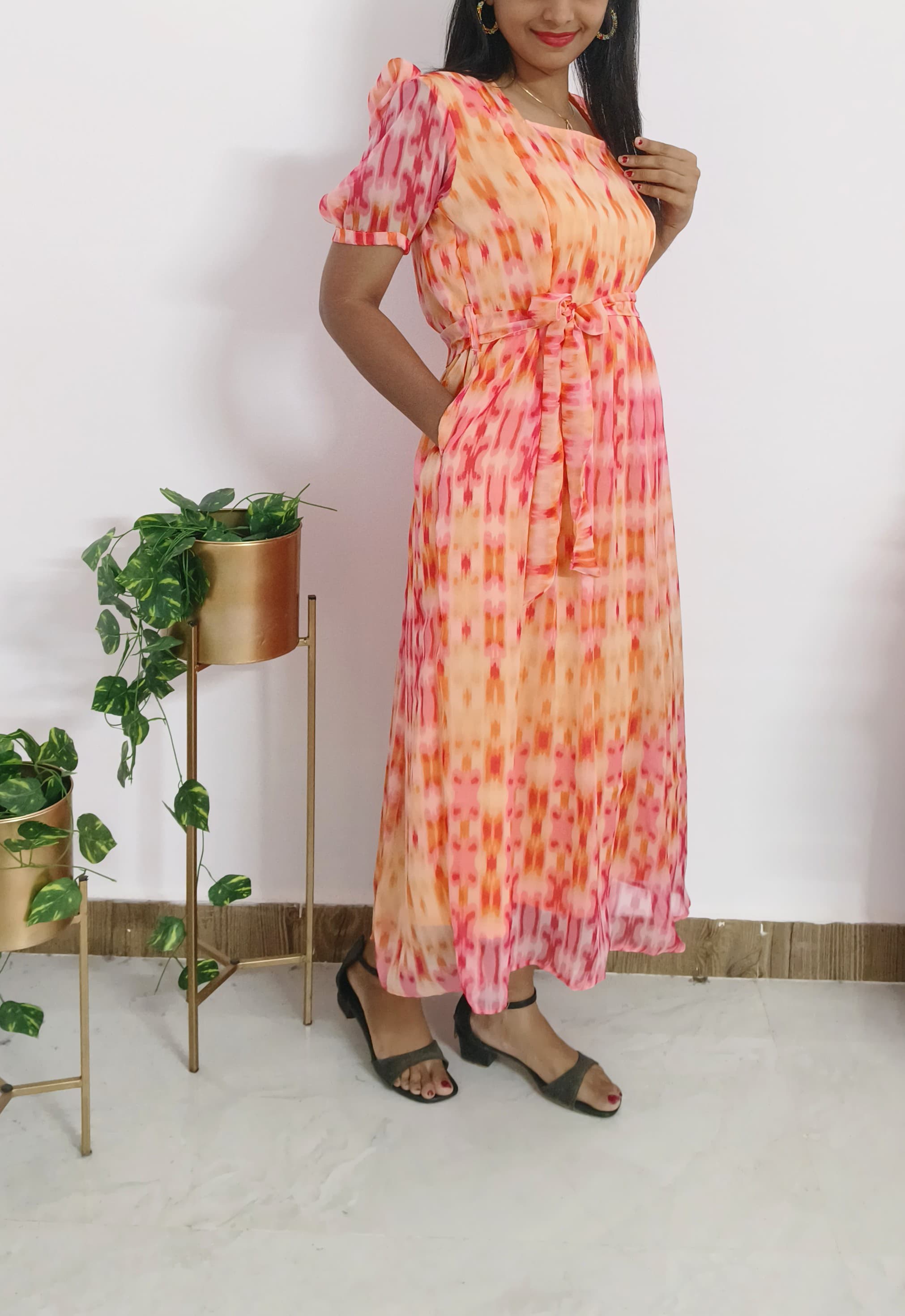 Anbarasi: Georgette pinkish orange feeding dress 