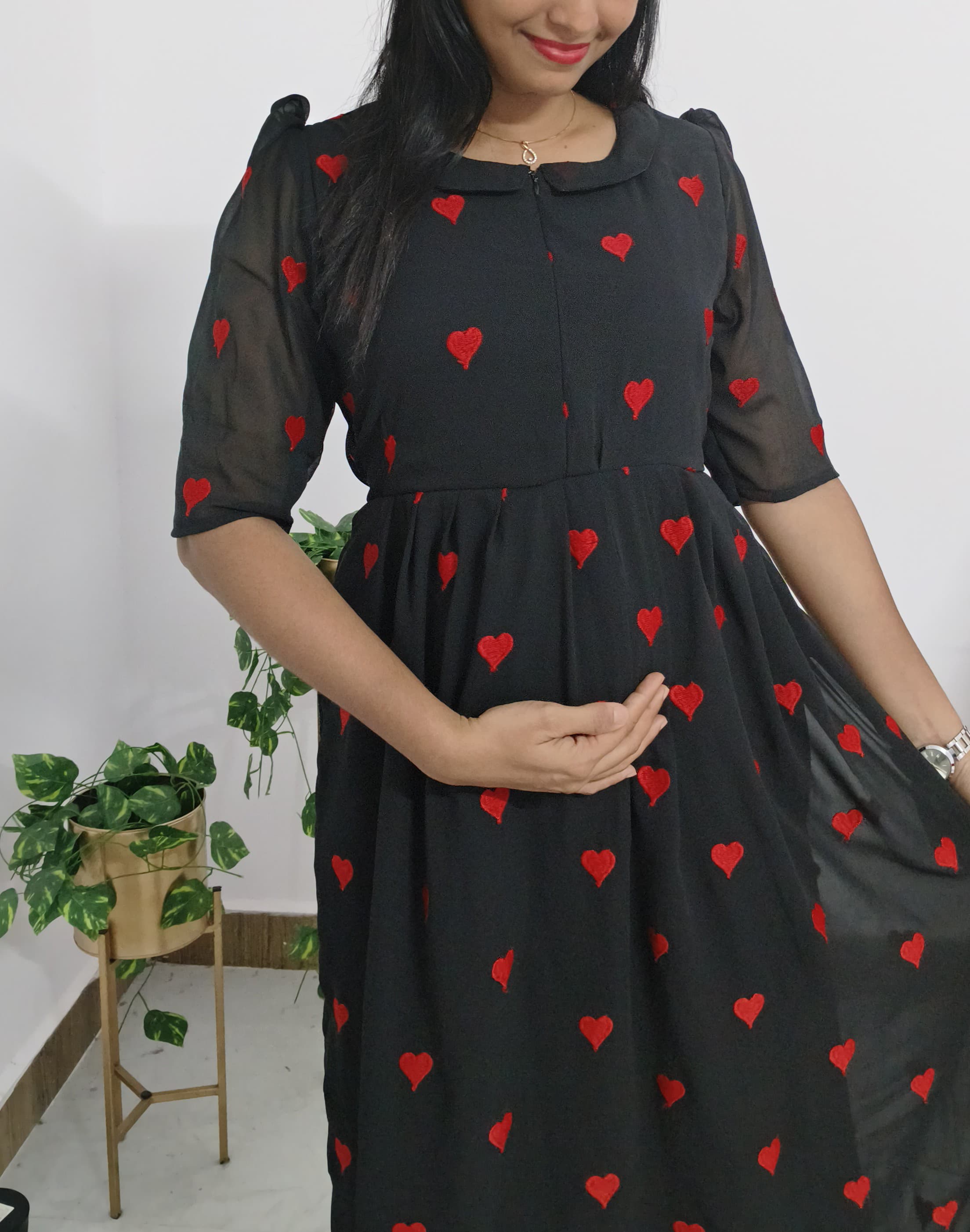 Anbarasi: Georgette black red heart embroidery 