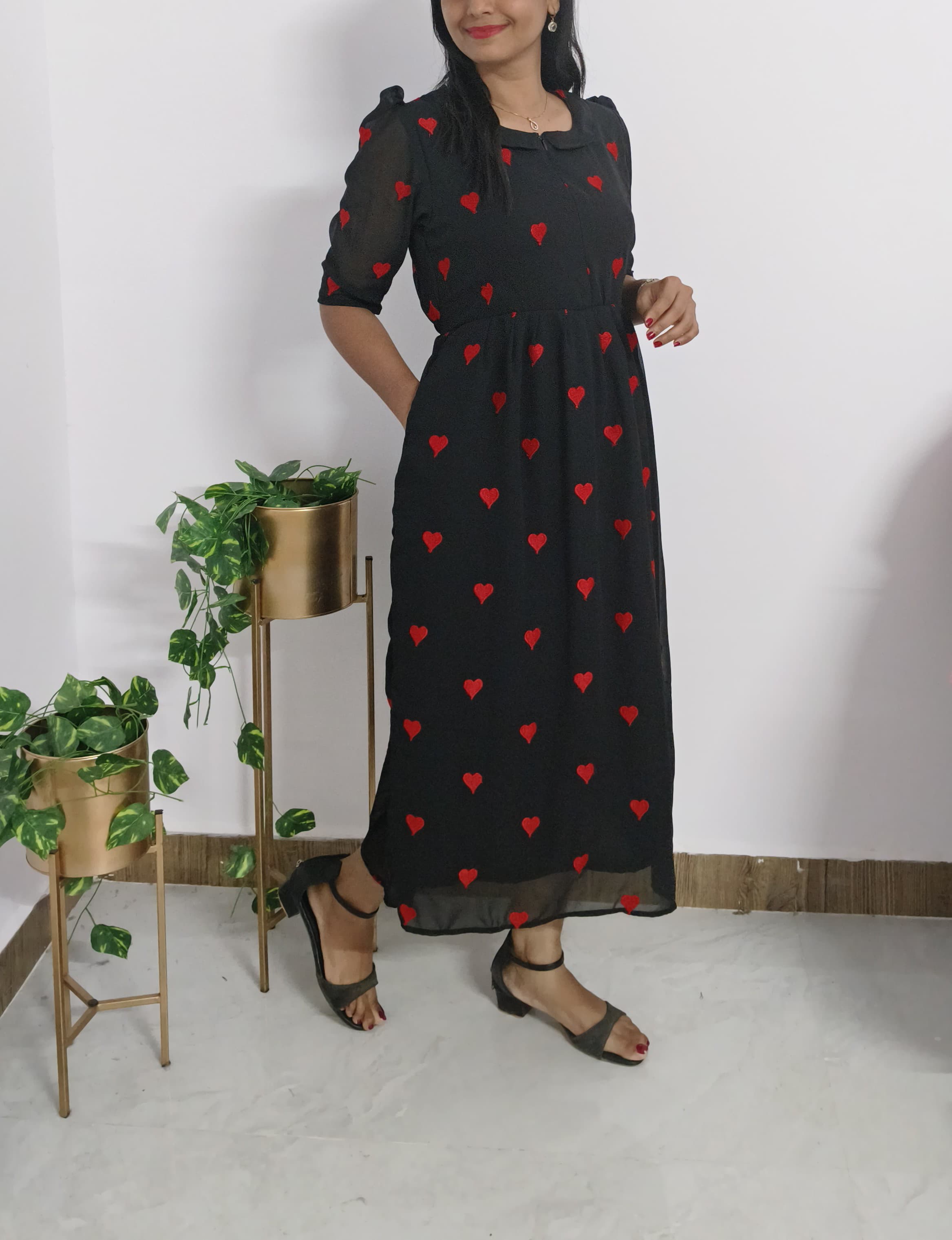 Anbarasi: Georgette black red heart embroidery 