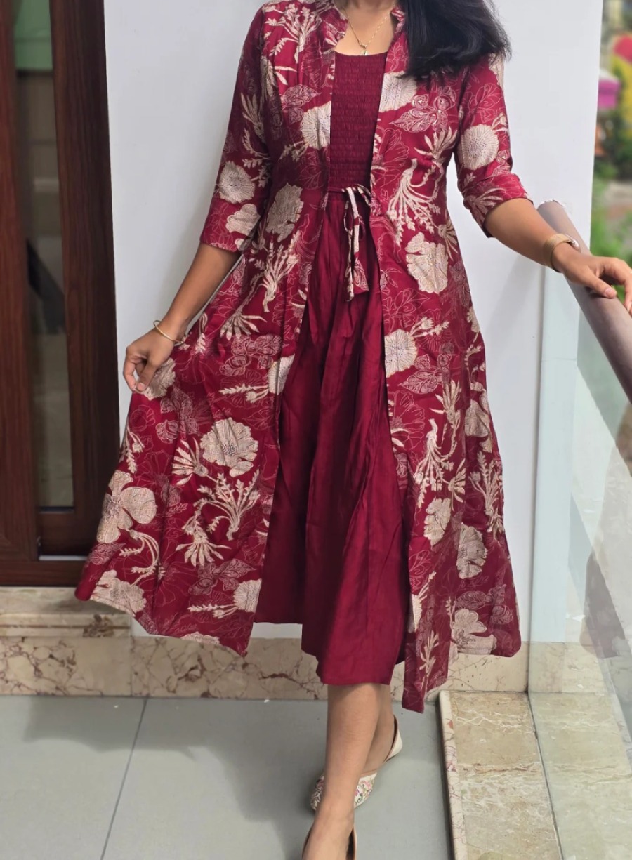 Anbarasi: Rayon western frock with coat attached