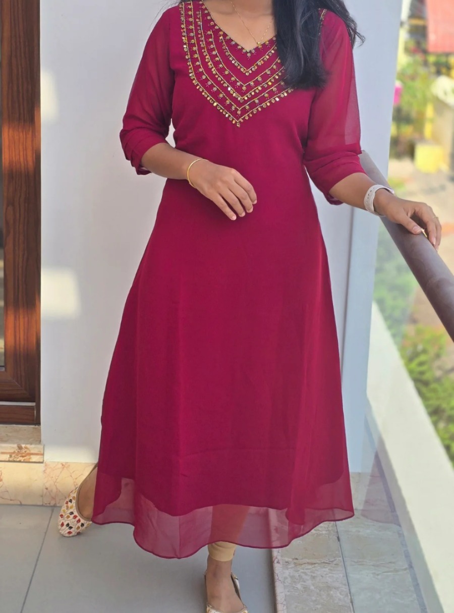 Anbarasi: Georgette A line with heavy neck work crepe lining