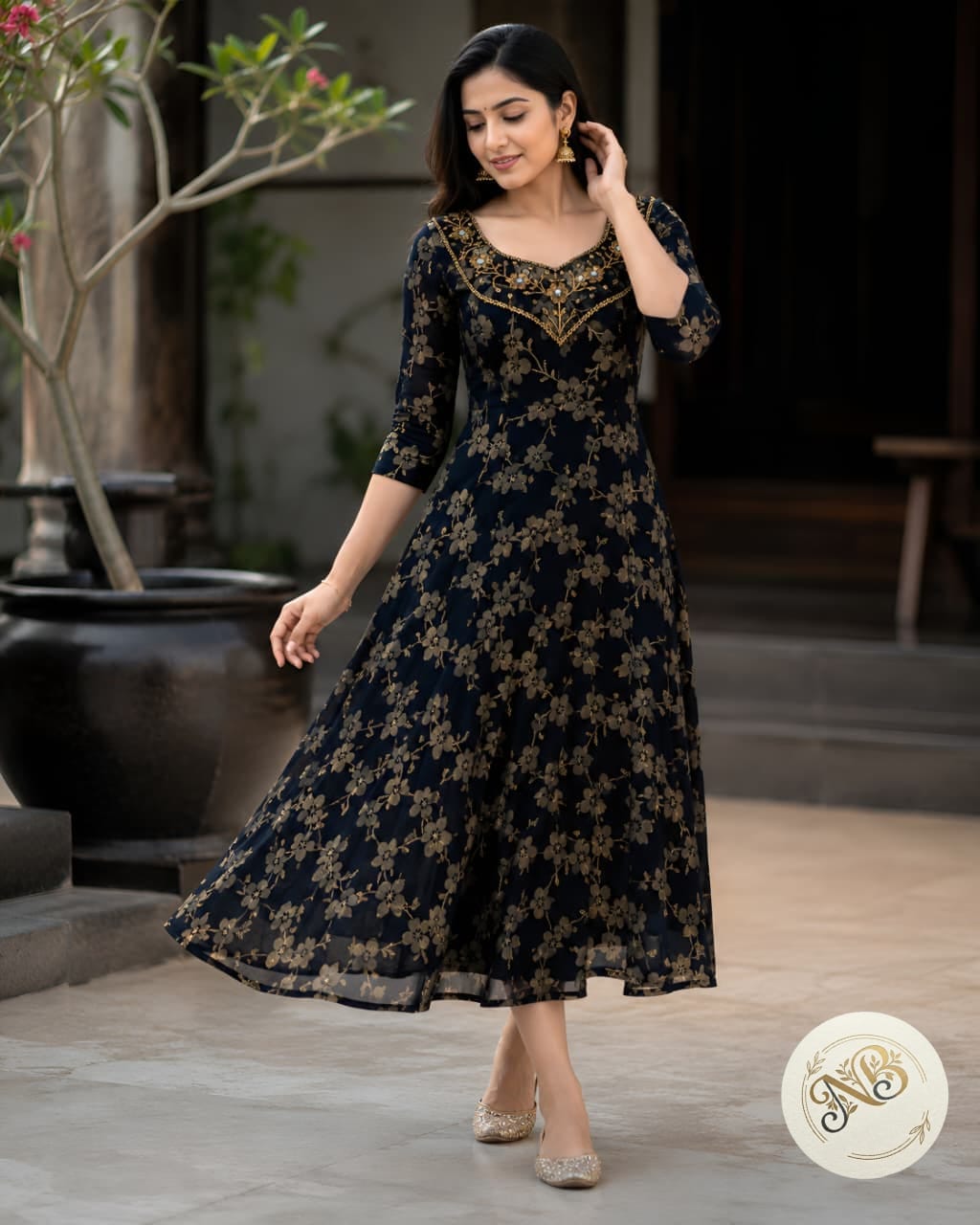 Anbarasi: Georgette partywear A line handwork kurti with lining
